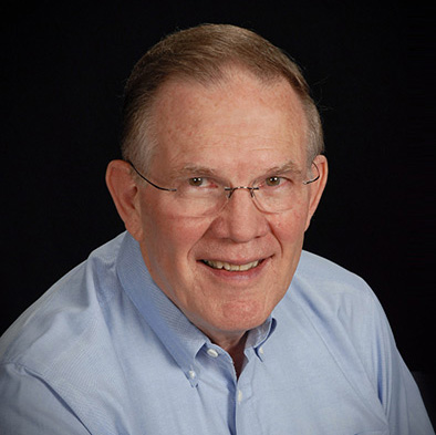 Dr. Robert M. Schwan, D.M.D., smiling in a light blue shirt, representing M.Y. Family Dentistry, emphasizing compassionate dental care in West Chester.
